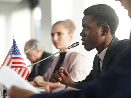  Student Speaking into microphone