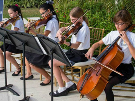  Students play orchestral instruments